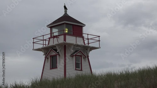 Lighthouse on the Atlantic coast in the Canadian province. photo