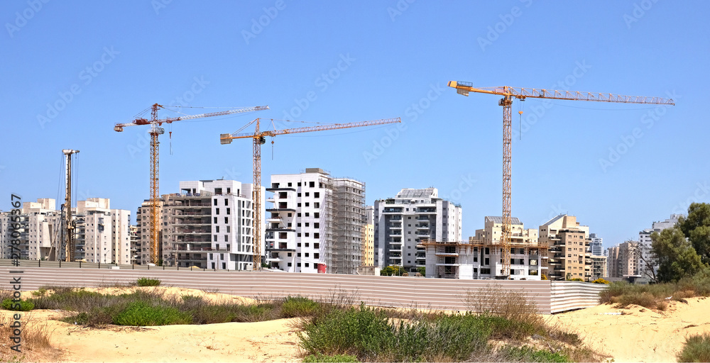 Building yard of Housing construction of houses in a new area of the city Holon in Israel