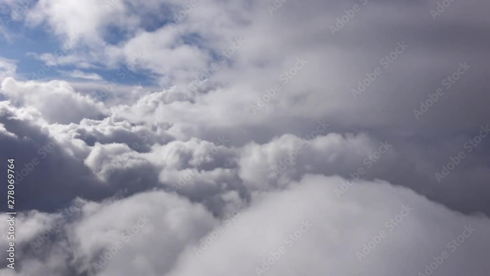flying on an airplane through storm clouds flying on an airplane through storm clouds
