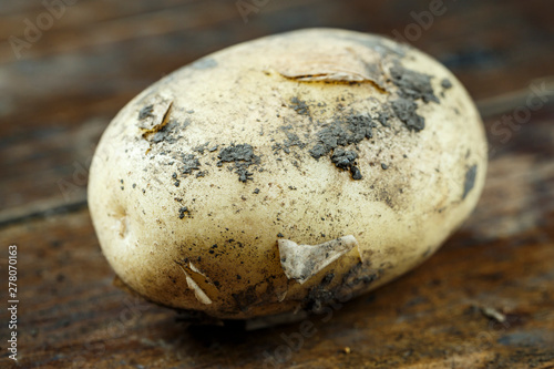 Young potatoes on a board