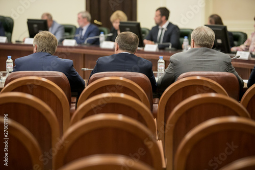 Session of Government. Conference room or seminar meeting room in business event. Academic classroom training course in lecture hall. blurred businessmen talking. modern bright office indoor