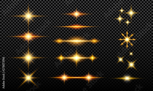 Collection of luminous glitter effects that are isolated with a dark background. Lights, stars that shine isolated from a transparent black background. photo
