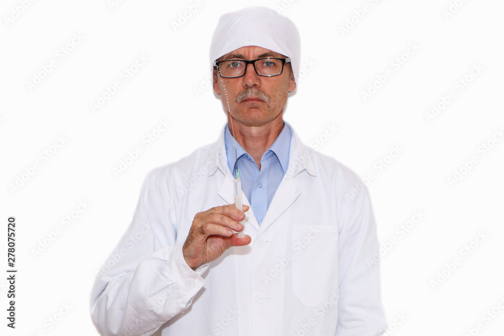 Health - Doctor holds a syringe for vaccination