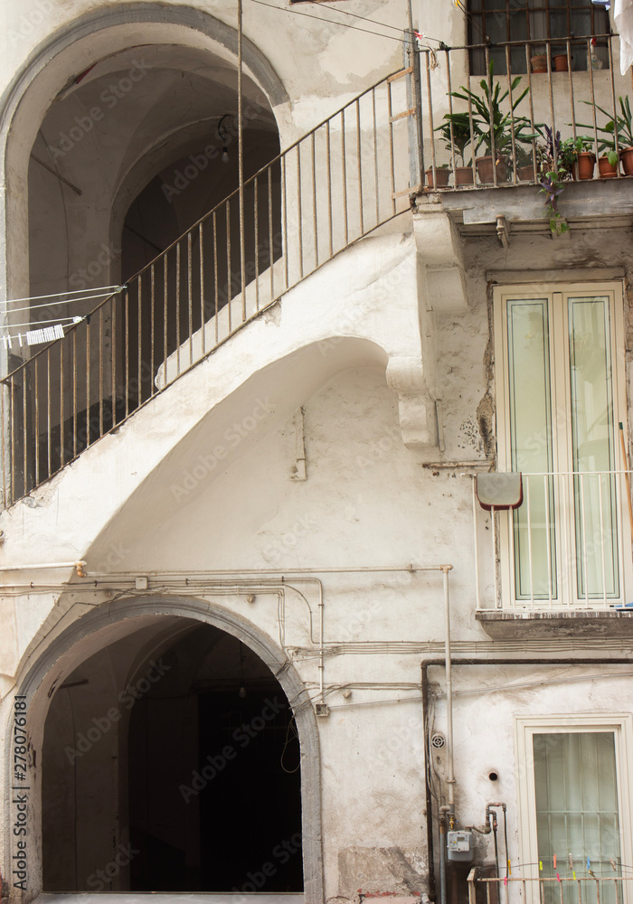 glimpse of an old buildine in Naples, Italy