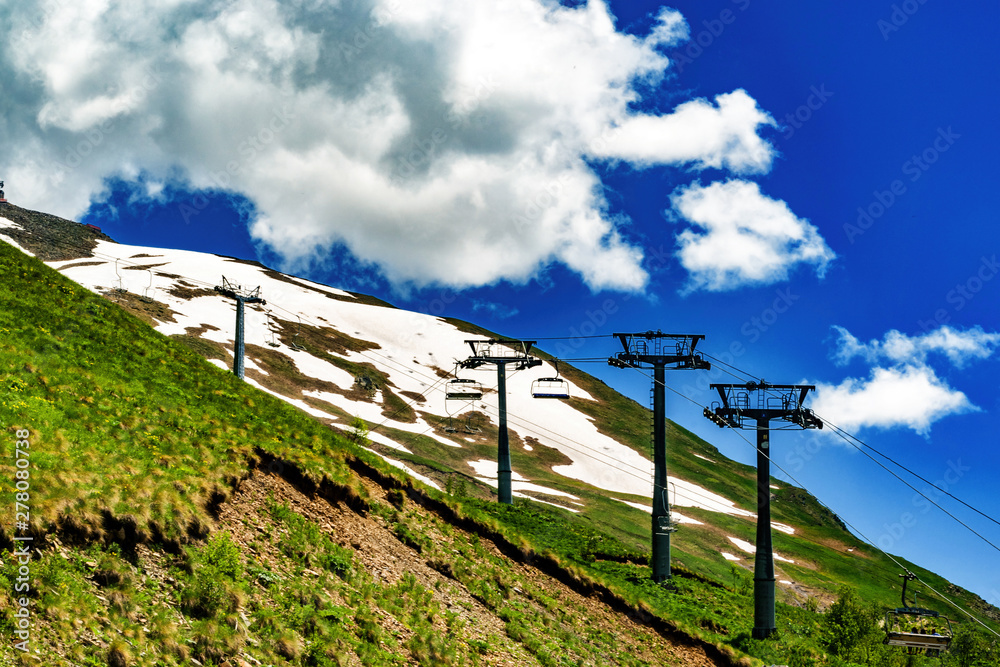 Obraz premium Mountain panorama in clouds. Caucasus, region Dombay.