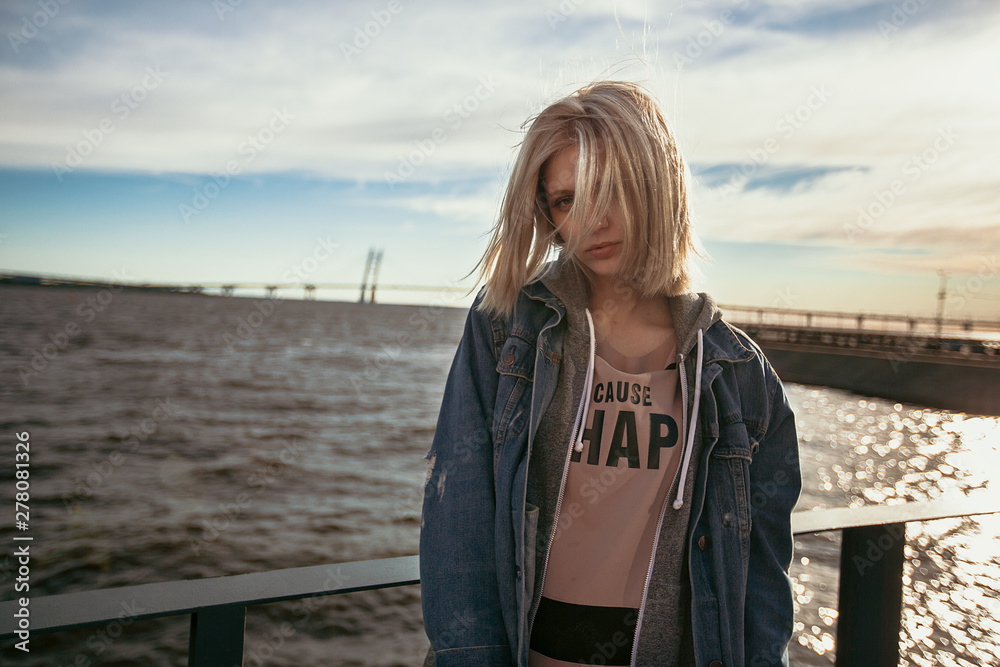 Beautiful girl with long hair walks around the city Beautiful girl with long hair walks around the city