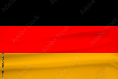 national flag of the country Germany on gentle silk with wind folds  travel concept  immigration  politics  copy space  close-up