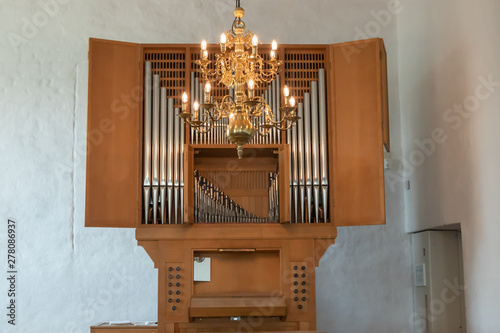 Turku, Finland - June 29, 2019: Organ of church in old medieval castle. photo