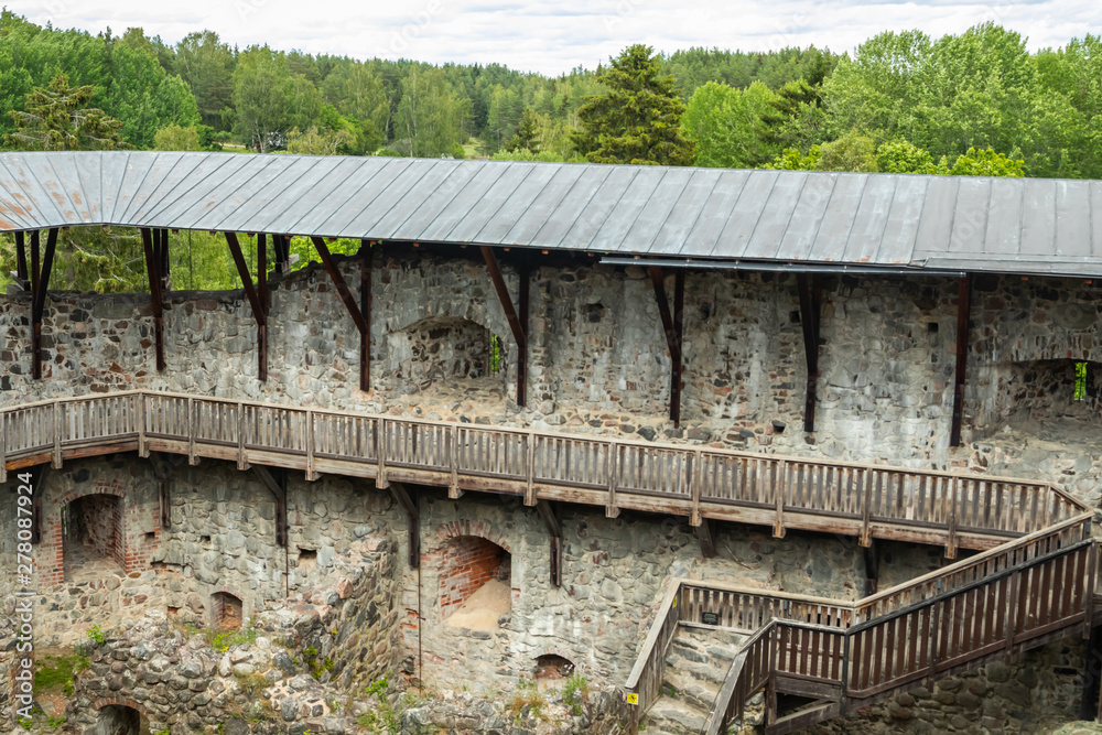 Obraz premium Medieval Raseborg castle courtyard on a rock in Finland at summer