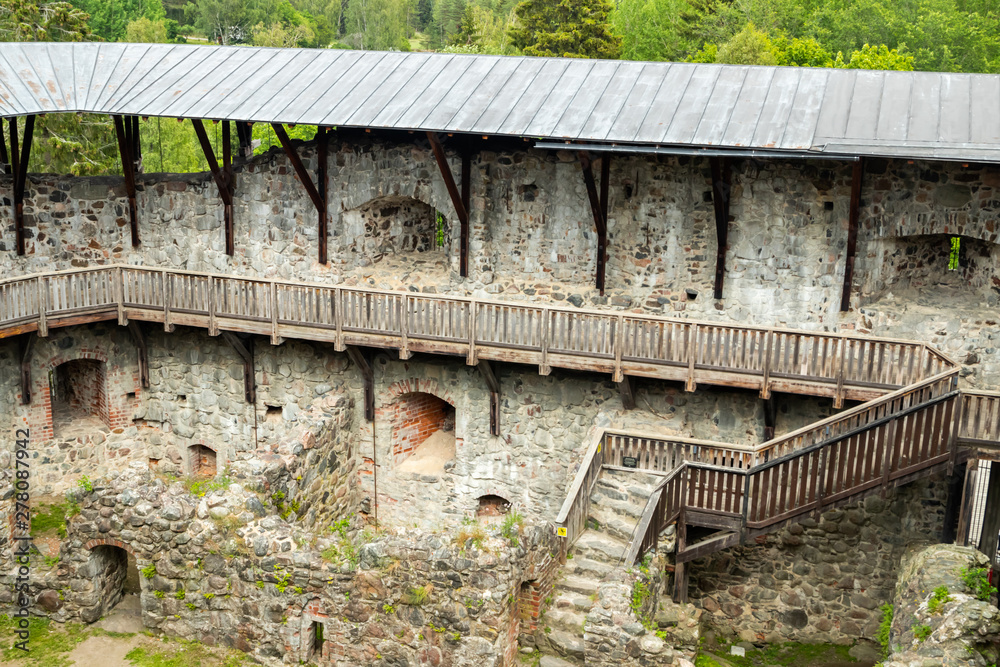 Obraz premium Medieval Raseborg castle courtyard on a rock in Finland at summer