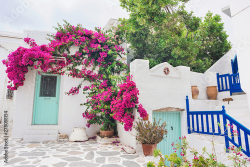 Fototapeta Naklejka Na Ścianę i Meble -  Traditional greek house with flowers in Paros island, Greece
