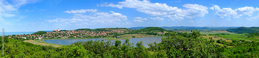 Panoramic view of Tihany village with the Lake Balaton and the inner lake and the rural with hills, meadows and forests Panoramic view of Tihany village with the Lake Balaton and the inner lake and the rural with hills, meadows and forests