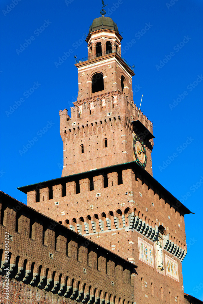 The Filarete Tower of Sforza castle in Milan, italy with blue sky on the background