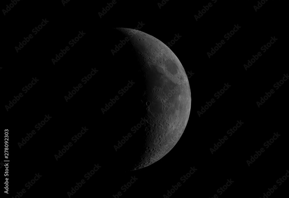 Great waxing crescent Moon phase, isolated in the black space, with its craters. Great waxing crescent Moon phase, isolated in the black space, with its craters.