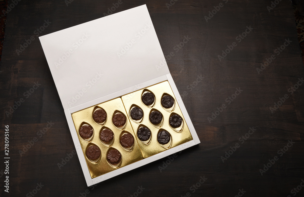 Box of chocolate on wood background with copy space Box of chocolate on wood background with copy space