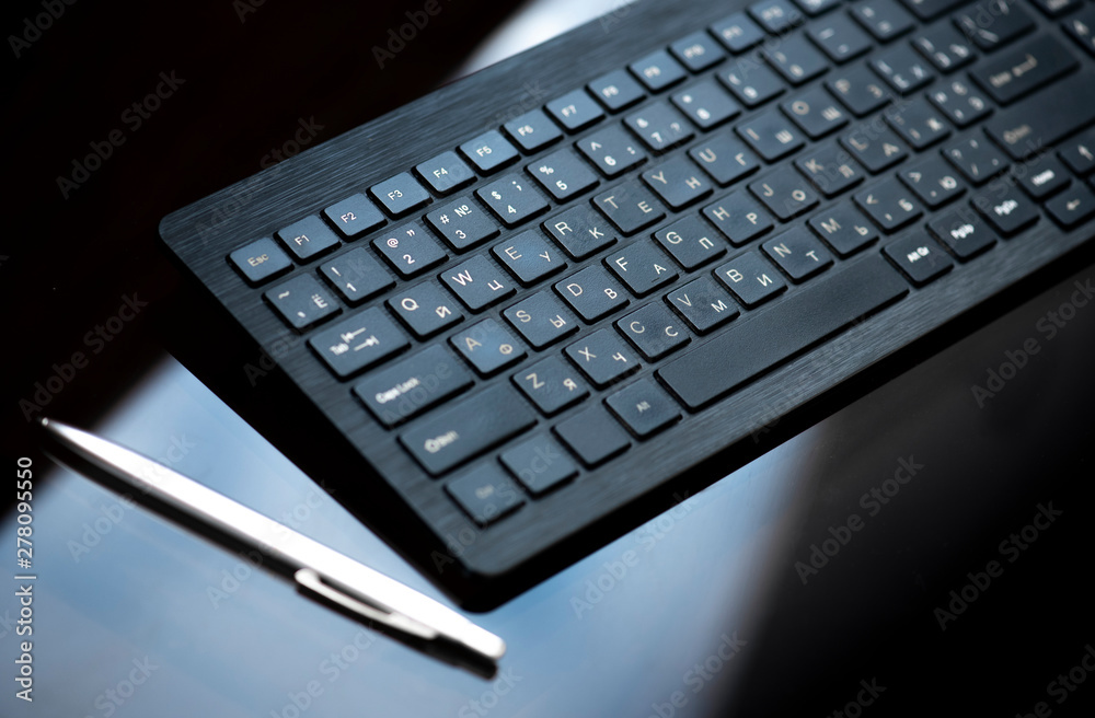 Office desk table with keyboard and pen. Office desk table with keyboard and pen.