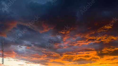 Fire Orange Sunset With Blue Cloud Background © Christopher Boswell