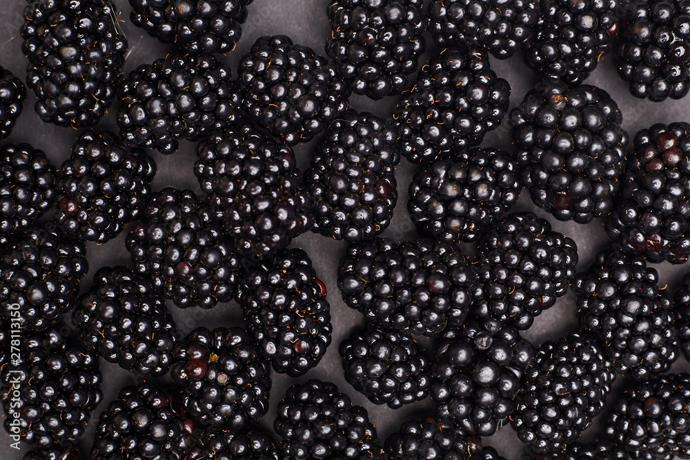Three blackberries isolated on black Three blackberries isolated on black