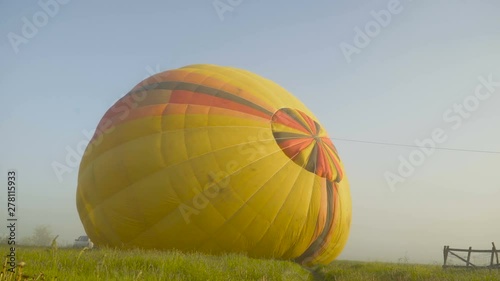 Inflating a hot air balloon at the Balloon festival 4K photo