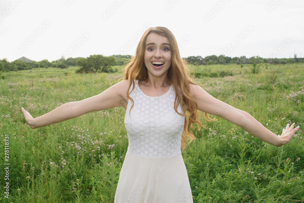 Beautiful young girl shows joy in nature Beautiful young girl shows joy in nature