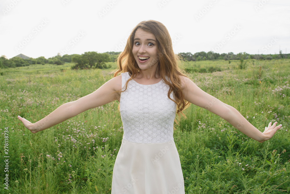 Beautiful young girl shows joy in nature Beautiful young girl shows joy in nature