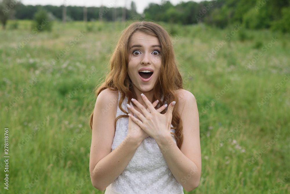 Beautiful young girl shows joy in nature Beautiful young girl shows joy in nature