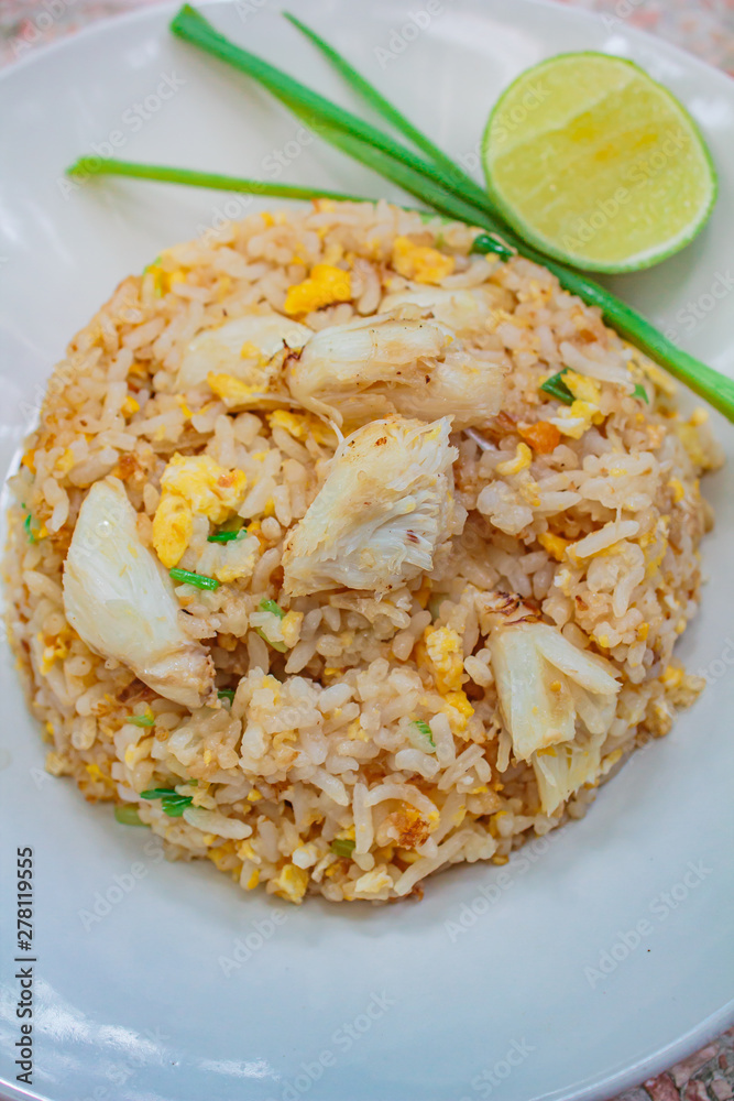 Fried rice with crab and vegetables at restaurant.