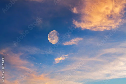 White moon over stormy clouds .   Dramatic nature background .  Full moon background .  landscape . eclipse of the moon photo