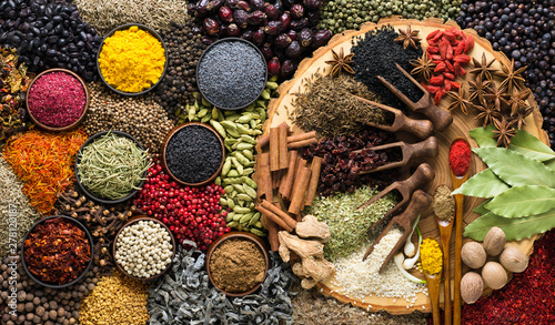 Fototapeta Naklejka Na Ścianę i Meble -  Aromatic herbs and spices background. Seasoning as ingredient for delicious food.