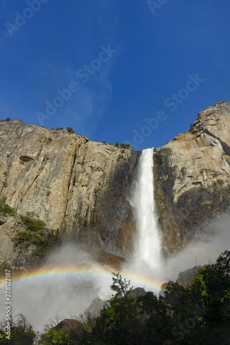 A rainbow at the base of Bridal Veil Falls in Yosemite Valley  Yosemite National Park  California in spring