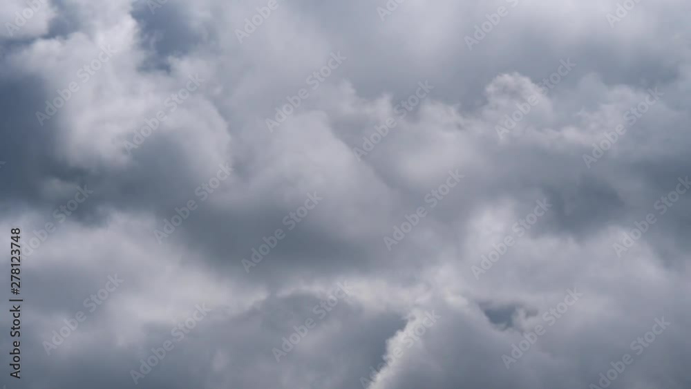 dark storm clouds passing over slow moving timelapse