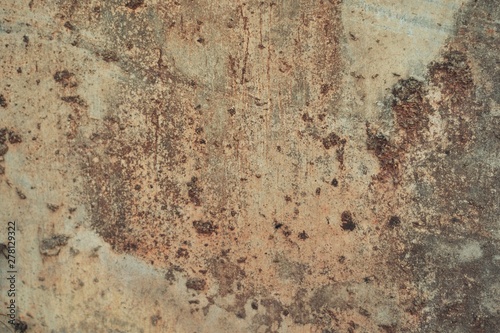Old wall that has patterns from the peeling color