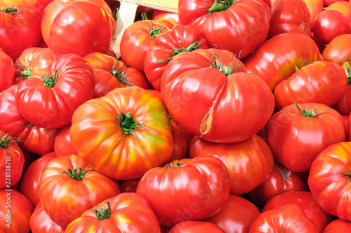 Fresh beef tomatoes for sale at a market