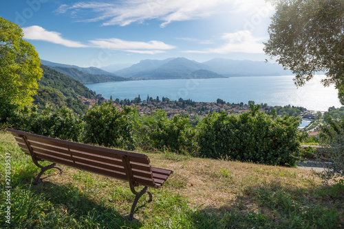 Big Italian lake. Lake Maggiore with the town of Maccagno, in the background the town of Luino. Amazing summer landscape