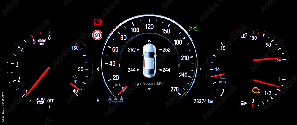 TPMS (Tyre Pressure Monitoring System) monitoring display on car dashboard panel. The pressure measurement given in kilopascal (kPa). Malfunction or check engine warning light control on car dashboard