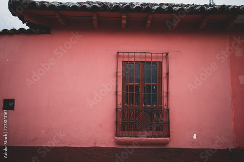 Red Window on Pink Wall of Building in Chiapas, Mexico © Xhico