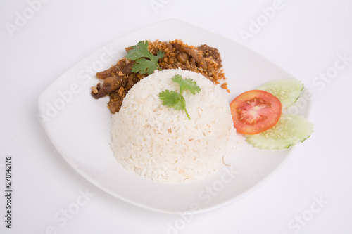 Rice with chicken fried with garlic and black pepper. Closeup for design-works (Thai Food)