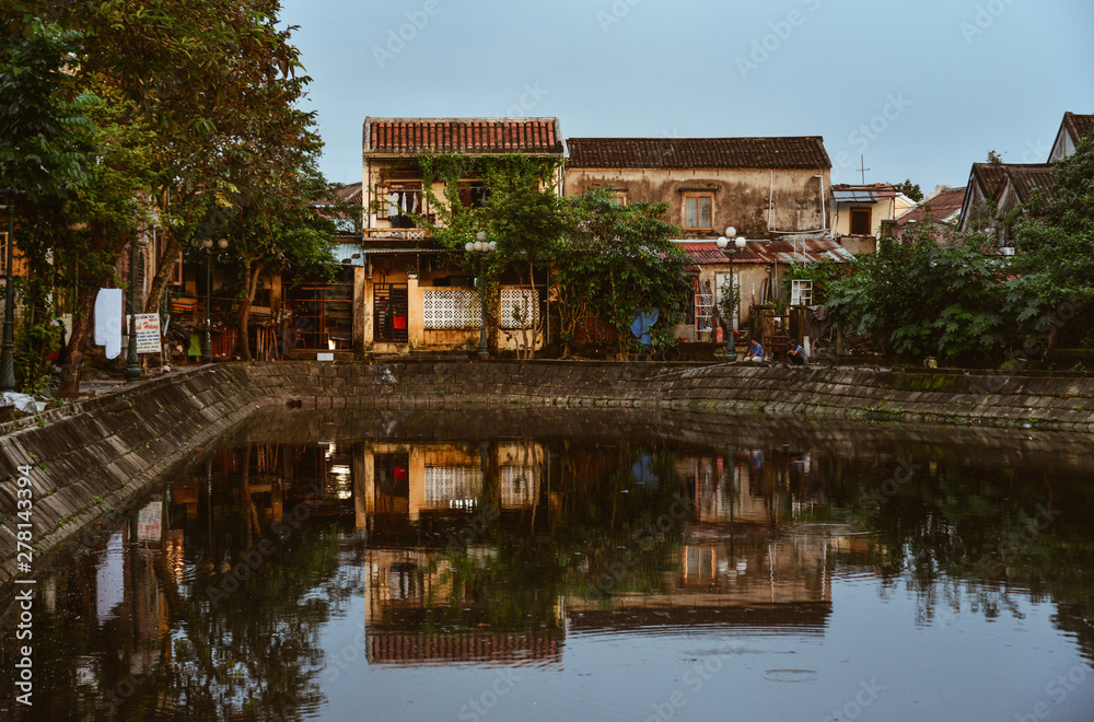 Old buildings with the river in Hoi An, Vietnam