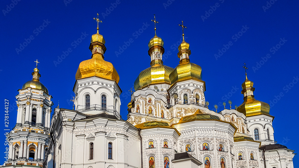 A close up on front entrance of Pechersk Lavra in Kiev, Ukraine. It is known as the Kiev Monastery of the Caves It is a historic Orthodox Christian monastery. Splendid and glamorous looking church.