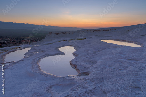 Carbonate travertines the natural pools during sunset  Pamukkale  Turkey