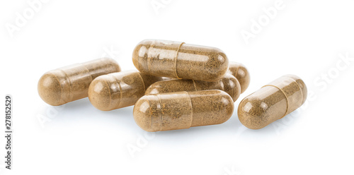 Herb capsules isolated on white background. photo
