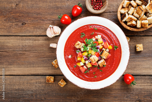 Tasty  summer tomato soup puree gazpacho with tomatoes and cucumbers. photo