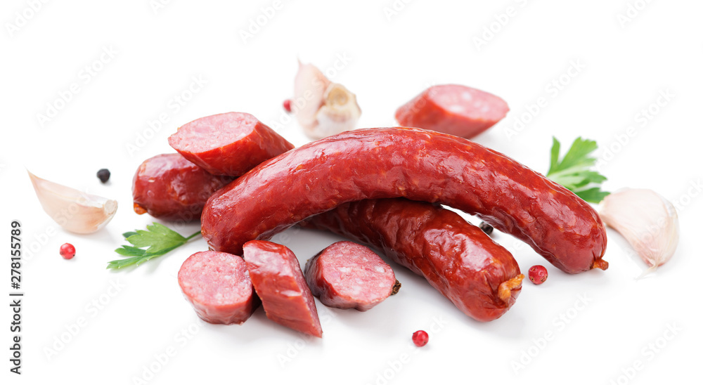 Smoked sausages with spice and parsley.isolated on white background Smoked sausages with spice and parsley.isolated on white background