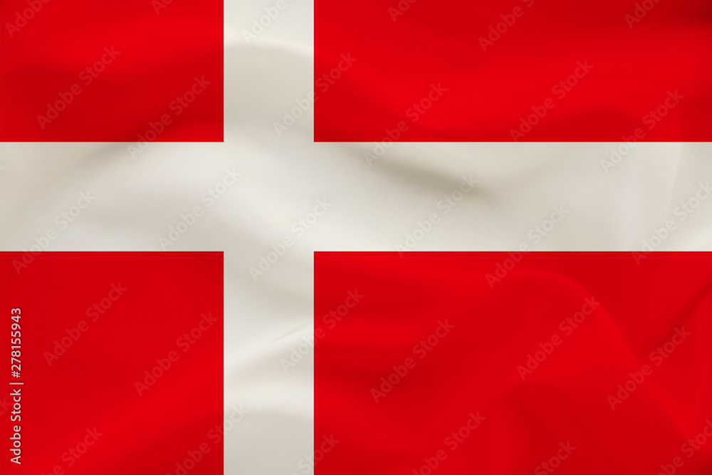 The national flag of the country of Denmark on the gentle silk with folds from the wind, the concept of travel, immigration, politics, copy space, close-up The national flag of the country of Denmark on the gentle silk with folds from the wind, the concept of travel, immigration, politics, copy space, close-up