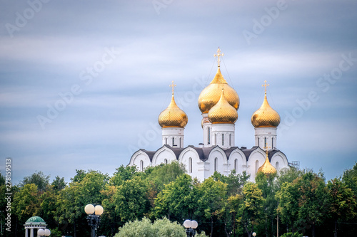 golden domes of the Russian church with crosses in Yaroslavl