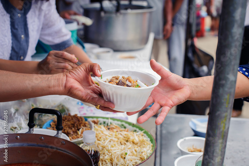 Donating food to the poor : People are experiencing a lot of poverty, Come and wait for free food