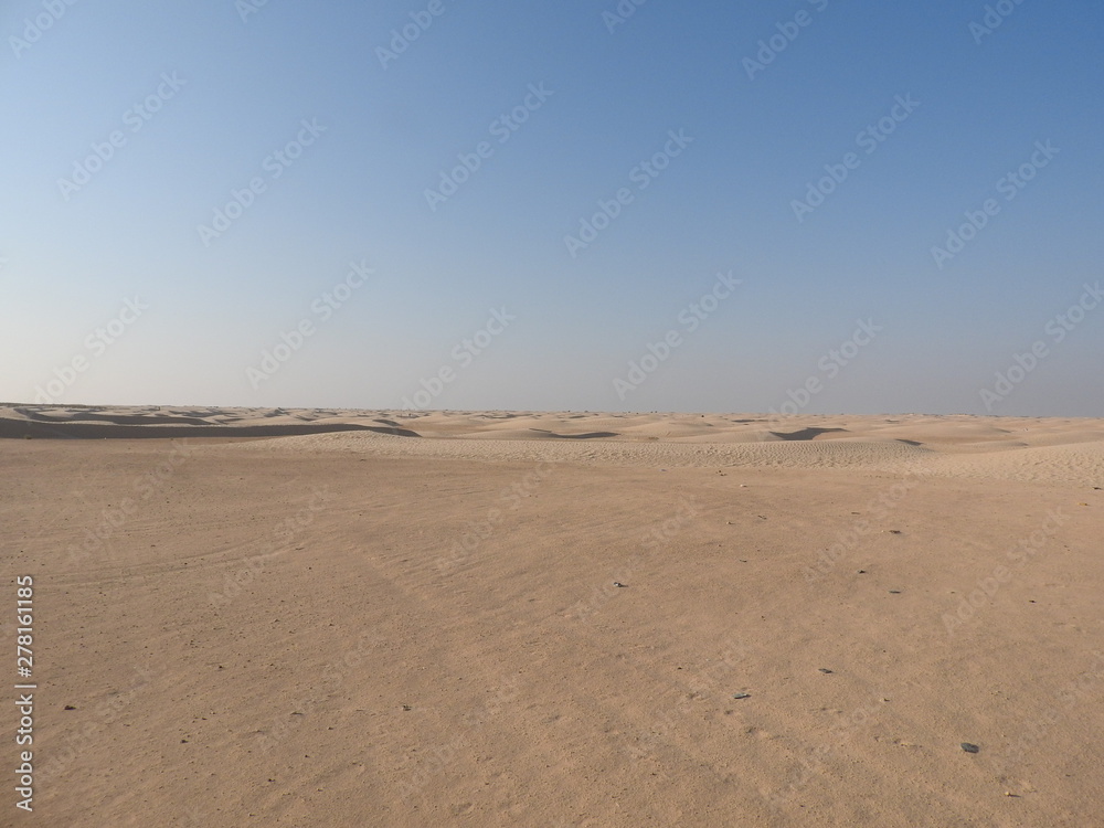 Dunes in the sahara, merzouga morocco. Golden desert dunes. Hills of the sahara. Evening in the desert. Lanscape morocco. Scenic view. Dunes in the sahara, merzouga morocco. Golden desert dunes. Hills of the sahara. Evening in the desert. Lanscape morocco. Scenic view.