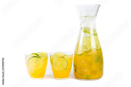Natural orange lemonade with citrus and mint on white background. Detox drink for a healthy lifestyle.
