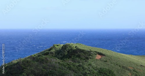 Miyakozaki promontory near the blue ocean in Amami oshima Kagoshima photo