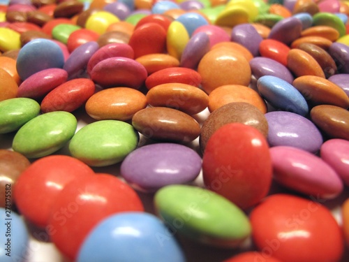 Colourful colorful candies sweets chocolates buttons Smarties Skittles M&M’s